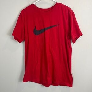The Nike Tee red branded shirt women size medium